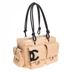 مملوكة مسبقًا حقيبة شانيل ريبورتر لاين كامبون جلد بيج مبطن