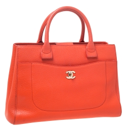 Pre Owned حقيبة يد شانيل نيو إكساكتيف شوبر صغيرة جلد برتقالية