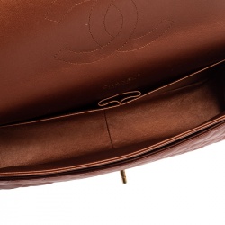 Pre Owned حقيبة شانيل ماكسي كلاسيك قلاب مزدوج جلد مبطن نحاسي ميتاليك