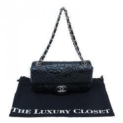 Pre Owned Chanel Black Patent Leather Embossed Medium Flap Bag