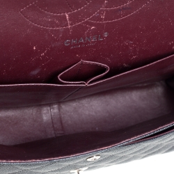 مملوكة مسبقًا حقيبة شانيل جامبو كلاسيك جلد كافيار بطن أسود بقلاب مزدوج