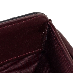 مملوكة مسبقًا محفظة شانيل كونتيننتال ين جلد مبطن أسود