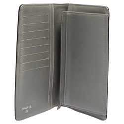 Pre Owned Chanel Black Camellia Embossed Leather Yen Continental Wallet