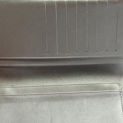 Pre Owned Chanel Black Camellia Embossed Leather Yen Continental Wallet