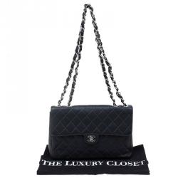 Pre Owned حقيبة شانيل جامبو كلاسيك جلد كافيار أسود مبطن بقلاب واحد