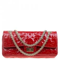 مملوكة مسبقًا Chanel Red Patent Leather Puzzle Reissue 2.55 East/West Flap Bag