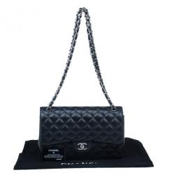 مملوكة مسبقًا حقيبة شانيل مبطن جامبو كلاسيك جلد خروف أسود