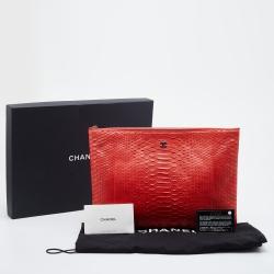 Pre Owned Chanel Orange Python Leather O Case Clutch