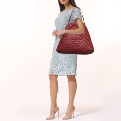Pre Owned Chanel Red Quilted Caviar Leather CC Drawstring Hobo