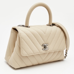Pre Owned Chanel Light Beige Quilted Caviar Leather Small Coco Top Handle Bag