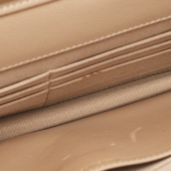 Pre Owned Chanel Beige Quilted Caviar Leather WOC Clutch Bag