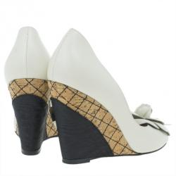 �مملوكة مسبقًا Chanel White Leather Camellia D'orsay Wedges Size 37