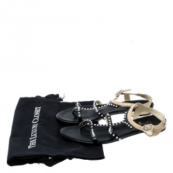 مملوكة مسبقًا صندل فلات شانيل جلد بيج/أسود لؤلؤ صناعي مزخرف بسيور مقاس 37.5