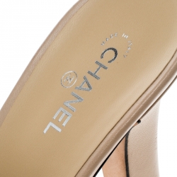 Pre Owned Chanel Beige/Black Leather Cap Toe Mules Size 41.5