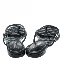 Pre Owned Chanel Black Leather Star Embellished Ankle Strap Flat Thong Sandals Size 37.5