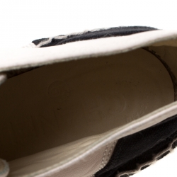 مملوكة مسبقًا حذاء رياضي شانيل مقدمة سوداء CC اسبادريل جلد بيج و كانفاس أسود مقاس 38