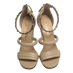مملوكة مسبقًا Chanel Beige Quilted Leather Charm Embellished Ankle Cuff Wedge Sandals Size 36