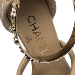 مملوكة مسبقًا Chanel Beige Quilted Leather Charm Embellished Ankle Cuff Wedge Sandals Size 36