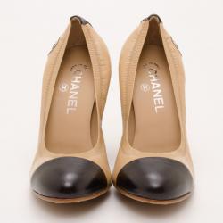 Pre Owned Chanel Beige and Black Leather Cap Toe Pumps Size 38.5