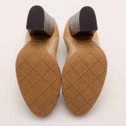 Pre Owned Chanel Beige and Black Leather Cap Toe Pumps Size 38.5