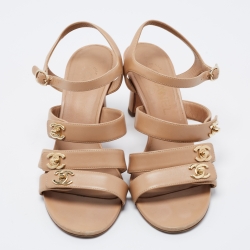 مملوكة مسبقًا Chanel Beige Leather Strappy Turnlock Ankle Strap Sandals Size 37.5