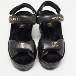 Pre Owned Chanel Black Quilted Leather Logo Wedge Ankle Strap Sandals Size 38