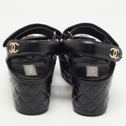 Pre Owned Chanel Black Quilted Leather Logo Wedge Ankle Strap Sandals Size 38