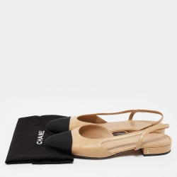 مملوكة مسبقًا Chanel Beige/Black Leather and Canvas Cap Toe Slingback Flat Sandals Size 36.5