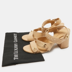 Pre Owned Chanel Beige Textured Leather CC Turnlock Ankle Strap Sandals Size 39.5 