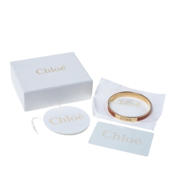 Pre Owned Chloé Orange Enamel Gold Tone Holly Bangle Bracelet