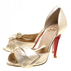 مملوكة مسبقًا صندل كريستيان لوبوتان جلد ذهبي ميتاليك بفيونكة T دورسيه مقدمة مفتوحة مقاس 35