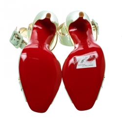 مملوكة مسبقًا حذاء كريستيان لوبوتان إسكاتين جلد لامع كريمي بحزام للكاحل مقاس 37.5