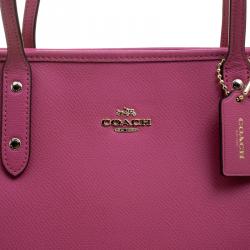 Pre Owned حقيبة كوتش سيتي زيب جلد وردي بسحاب