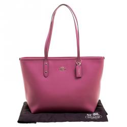 Pre Owned حقيبة كوتش سيتي زيب جلد وردي بسحاب