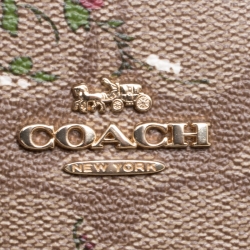 Pre Owned Coach Brown/Pink Floral Print Signature Coated Canvas and Leather Clutch 