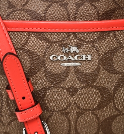 Coach Brown/Coral Orange Signature Canvas and Leather Swingpack File Crossbody Bag 