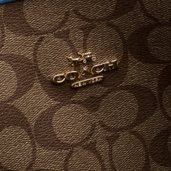 مملوكة مسبقًا حقيبة يد كوتش سيتي ريفرسيبل كانفاس مقوى شهير وطباعة زهور بيج/ كحلية