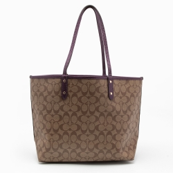 Pre Owned Coach Beige/Purple Signature Coated Canvas and Leather Reversible City Tote