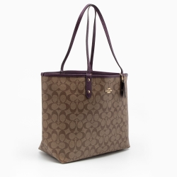 Pre Owned Coach Beige/Purple Signature Coated Canvas and Leather Reversible City Tote