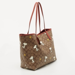 Pre Owned Coach Beige/Tan Snoopy Print Signature Coated Canvas and Leather City Shopper Tote