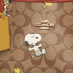 Pre Owned Coach Beige/Tan Snoopy Print Signature Coated Canvas and Leather City Shopper Tote