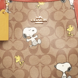 Pre Owned Coach Beige/Tan Snoopy Print Signature Coated Canvas and Leather City Shopper Tote