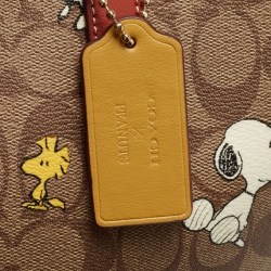Pre Owned Coach Beige/Tan Snoopy Print Signature Coated Canvas and Leather City Shopper Tote
