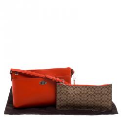 Pre Owned Coach Orange Leather East/West Pop Up Pouch Crossbody Bag