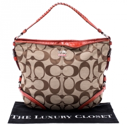 Pre Owned Coach Beige/Orange Signature Canvas and Patent Leather Katarina Hobo