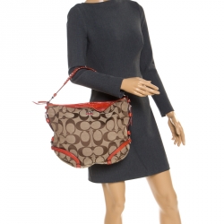 Pre Owned Coach Beige/Orange Signature Canvas and Patent Leather Katarina Hobo