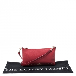 Pre Owned Coach Red Leather Herald Stud Crossbody Bag