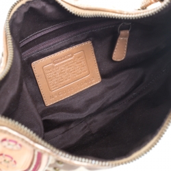 Pre Owned Coach Beige/Tan Signature Canvas and Leather Studded Mia Soho Hobo