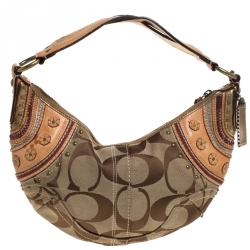 Pre Owned Coach Beige/Tan Signature Canvas and Leather Studded Mia Soho Hobo