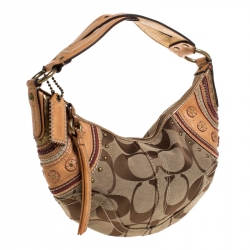 Pre Owned Coach Beige/Tan Signature Canvas and Leather Studded Mia Soho Hobo